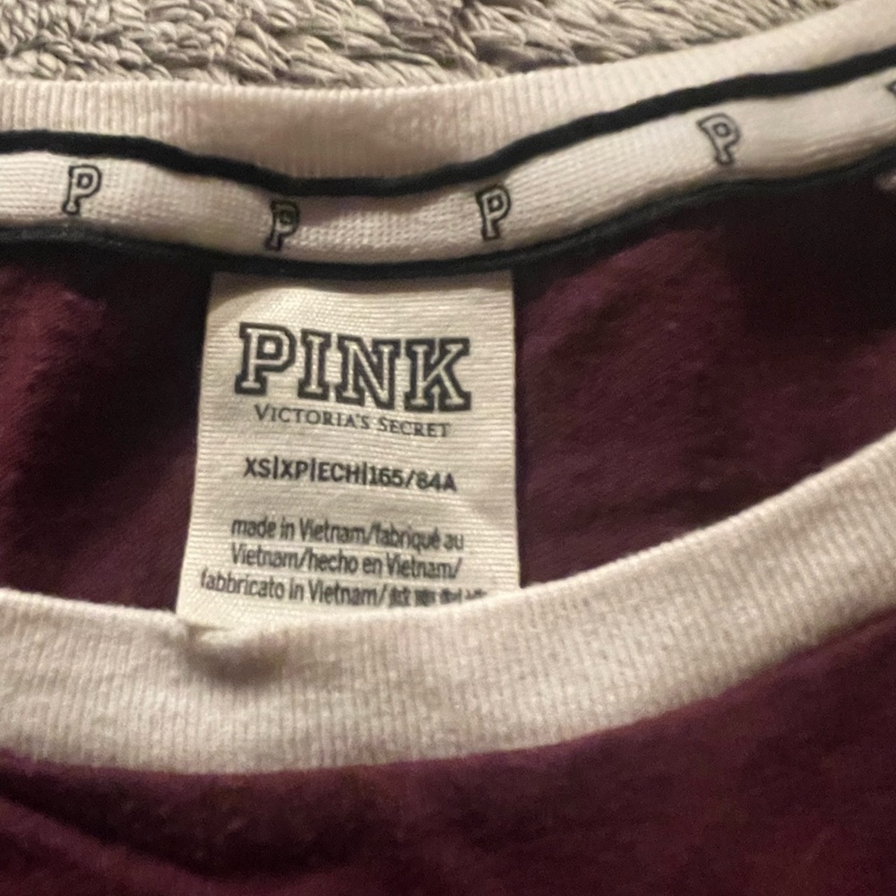 Selling xs Victoria secret tee shirt worn once no wash wear no stains nothing.